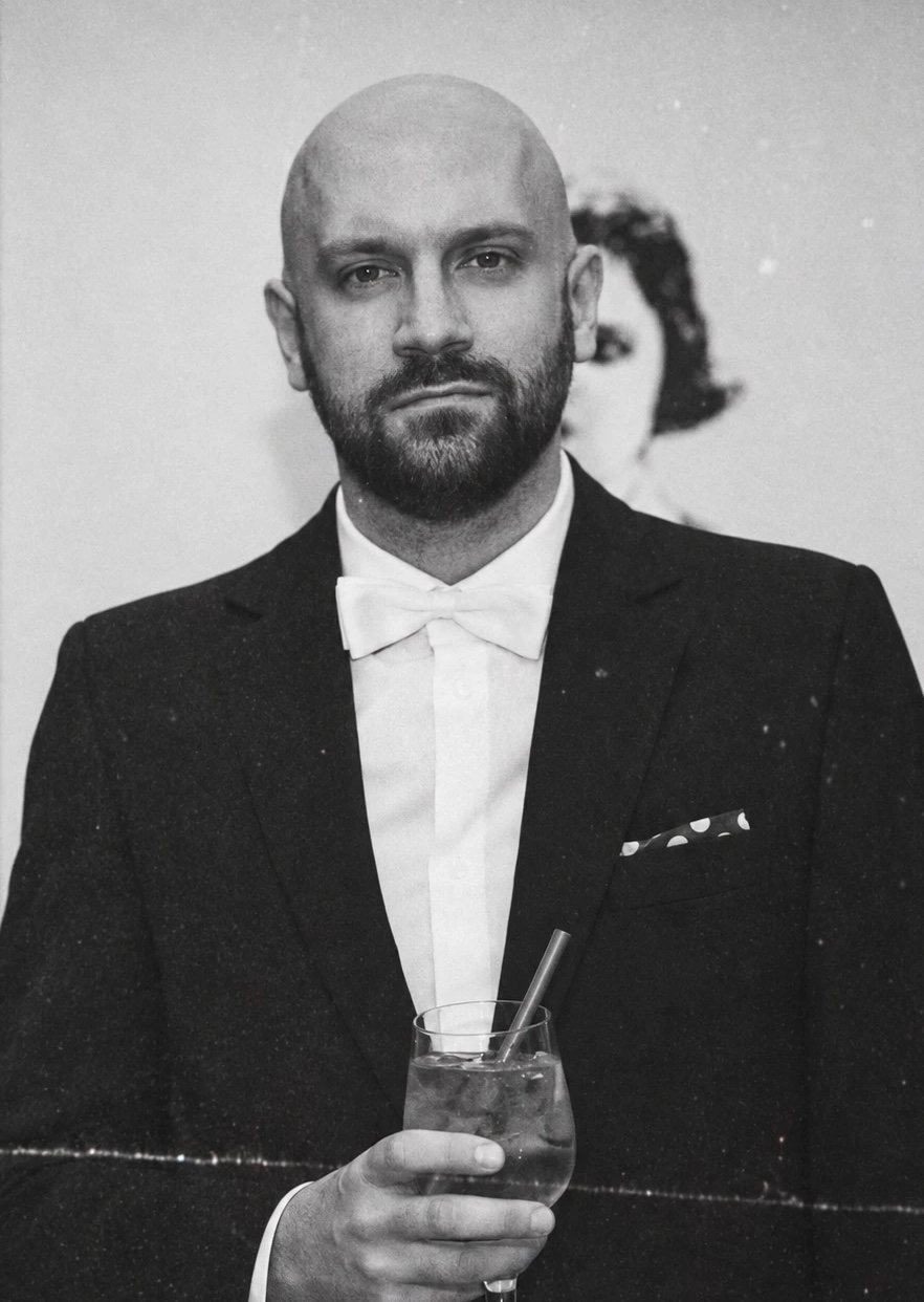 Jan Słobodzian in a tuxedo at an evening event